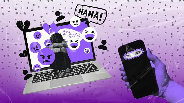 Mujer en el medio de una computadora acurrucada mientras salen de la pantalla emogis de risa, enojo